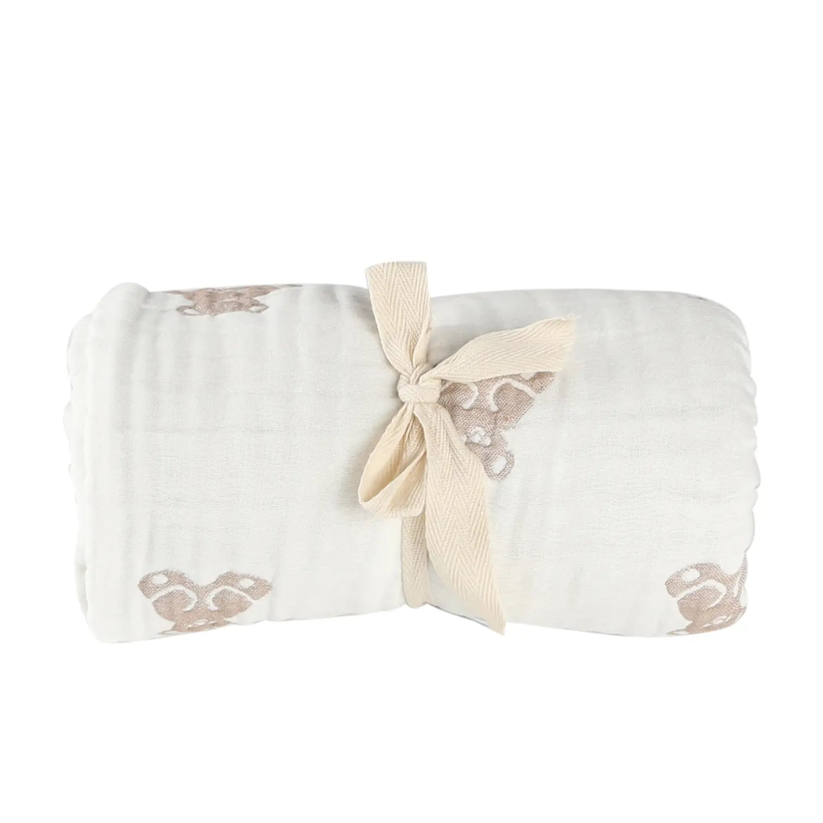 Folded teddy baby blanket with a bow on a white background