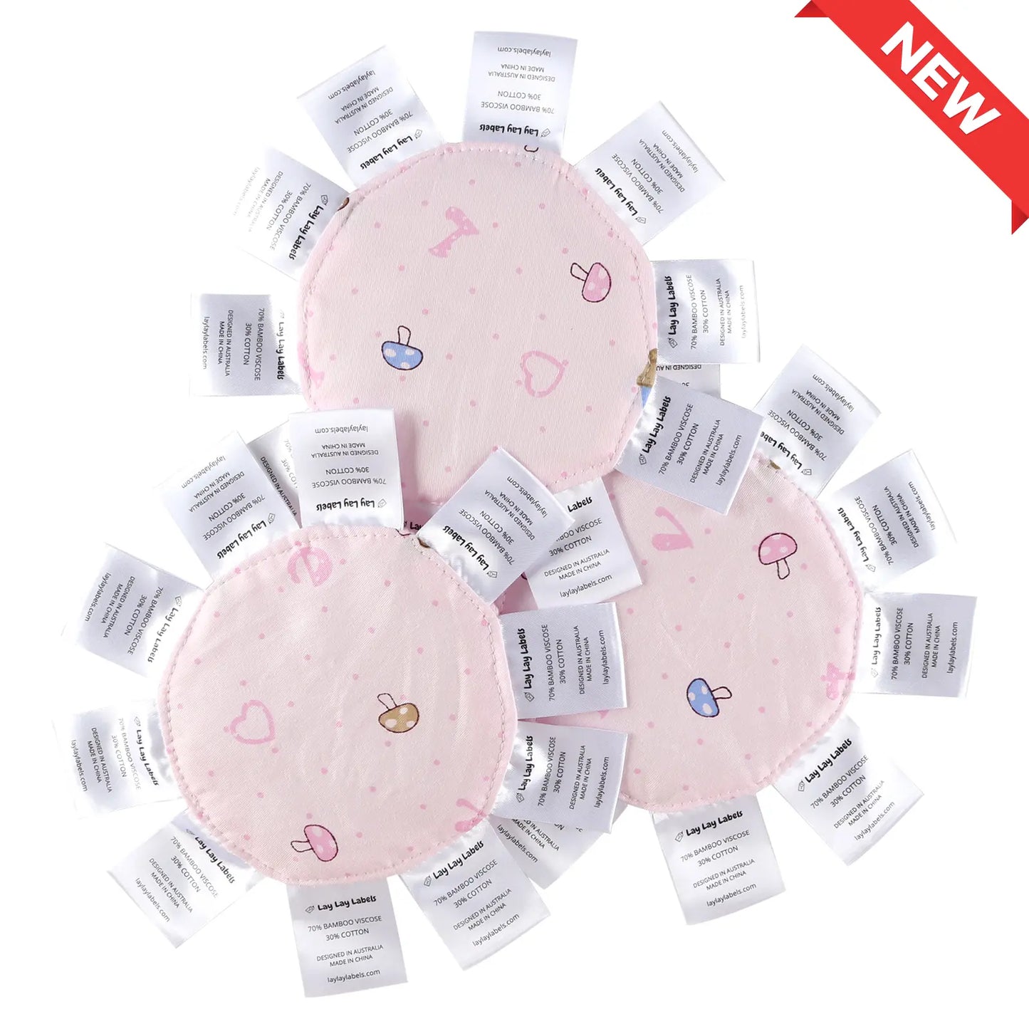 Three pink sensory baby minis with silk labels designed for soothing and play