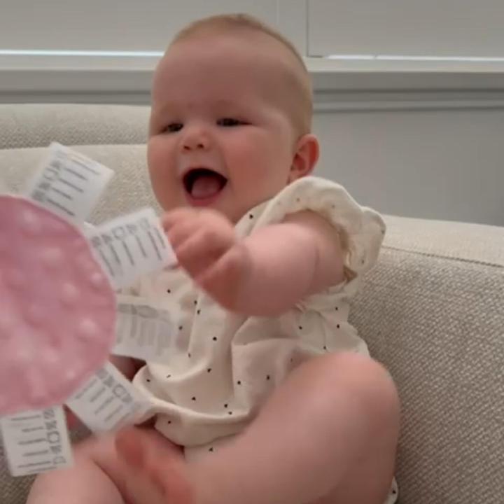 Video of babies exploring sensory minis with labels during calm play and everyday moments