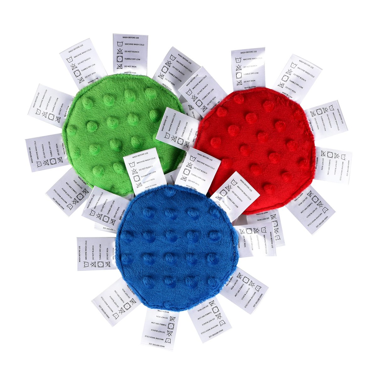 The backs of the three Minis in blue, red and green minky dot, edged with silk labels