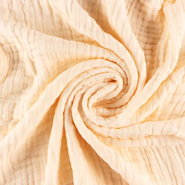 Pink bamboo muslin swirled into a spiral